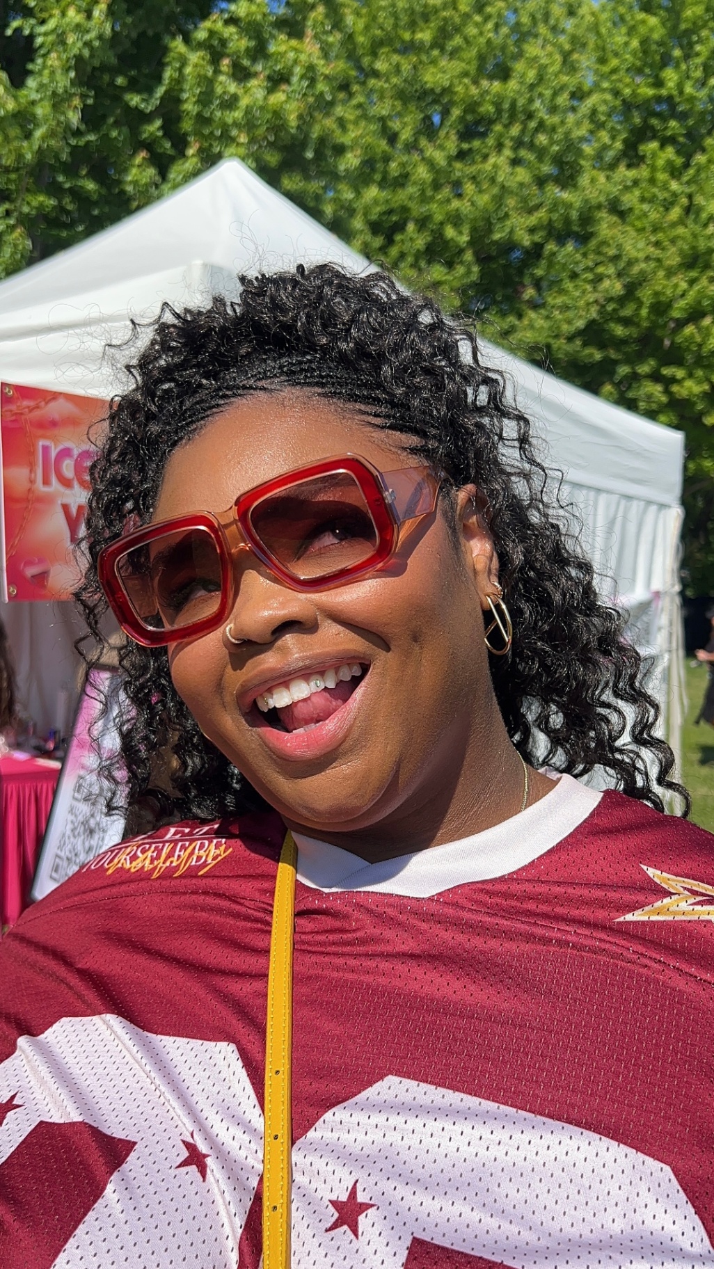 Gameday smile at the Iced By Yana event tent