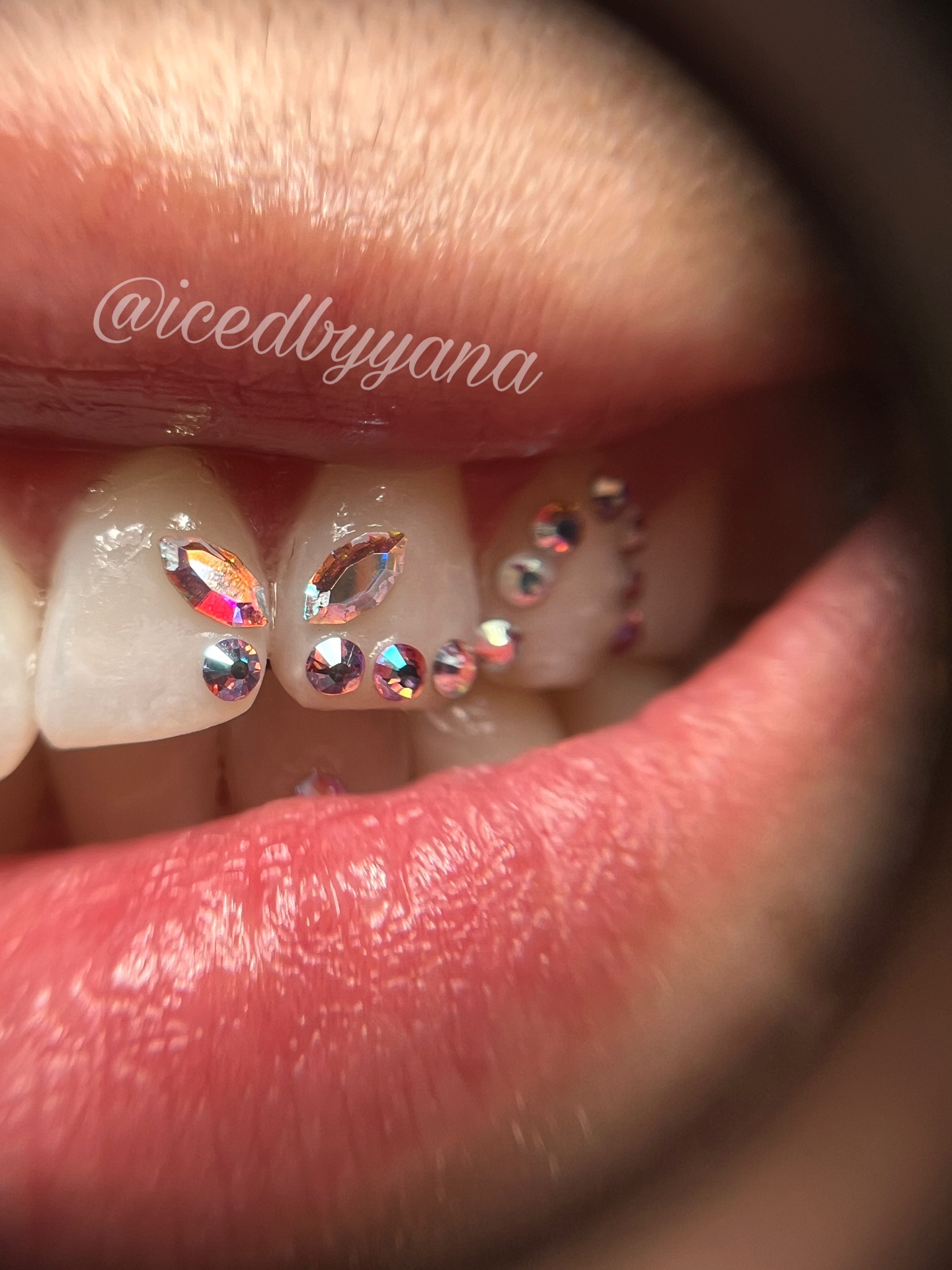 Macro of marquise and round crystal tooth gems